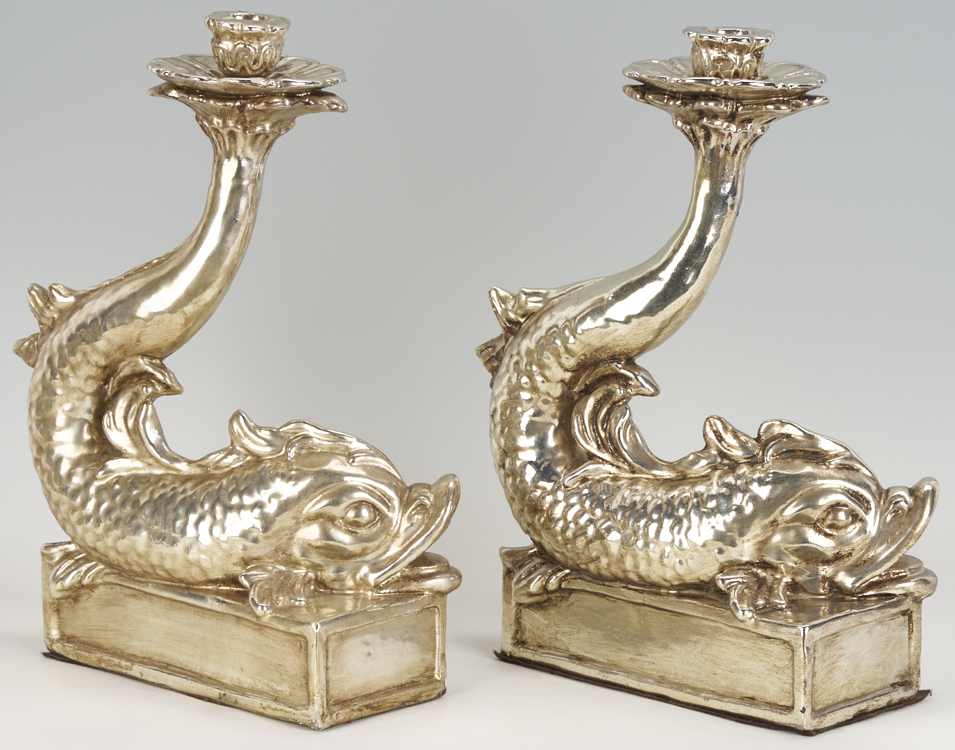 Lot 1253: Pr. Italian Silver Metal & Terracotta Dolphin Candle Holders