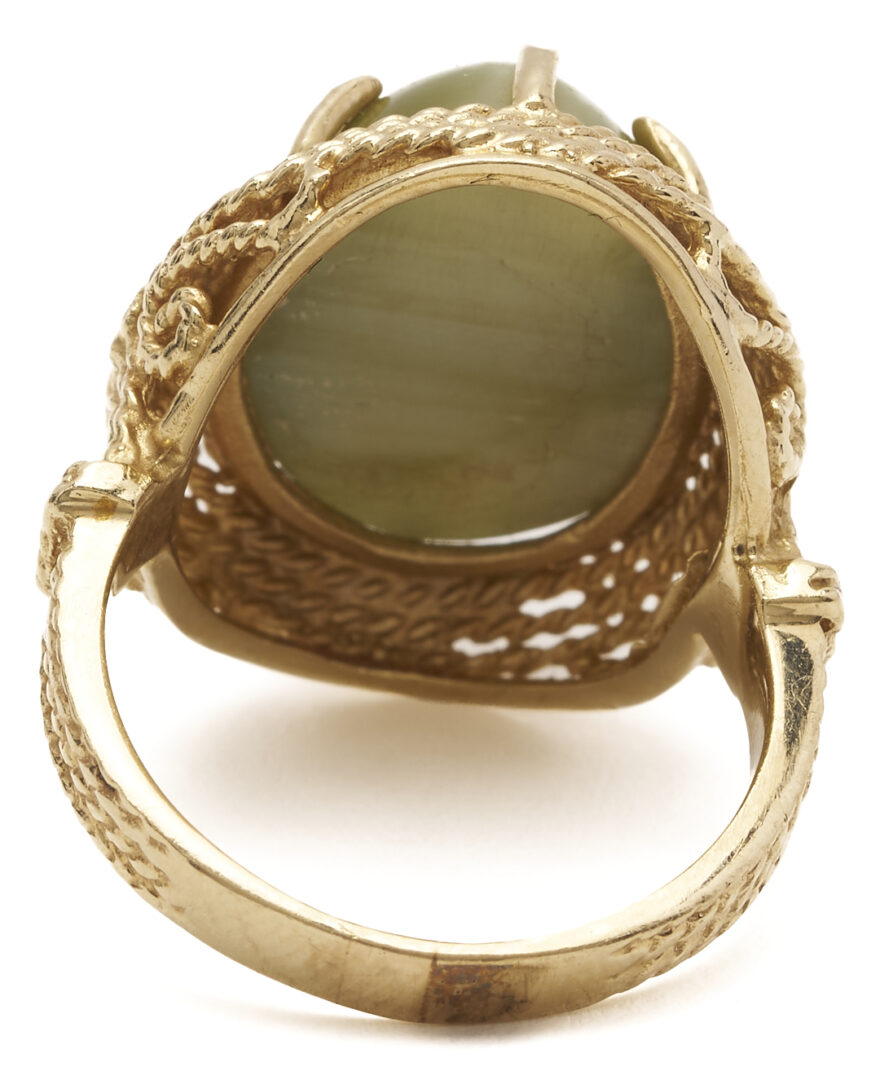 Lot 1266: 14K Gold Cats Eye Tourmaline Cabochon Ring
