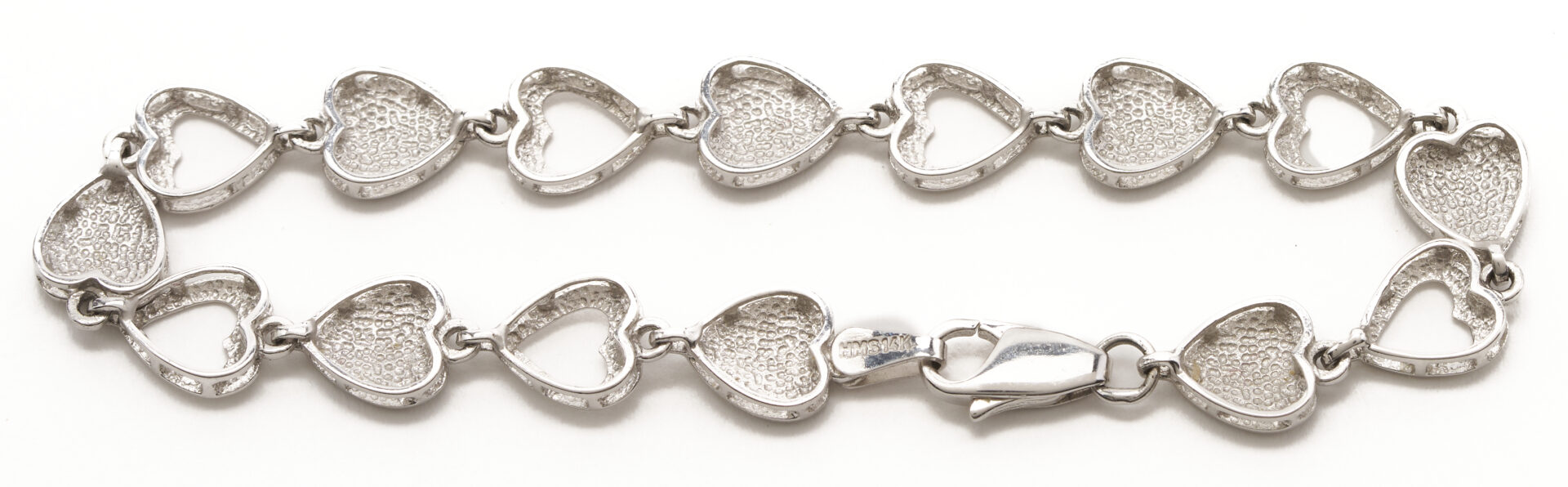 Lot 1270: 14K White Gold Heart Bracelet