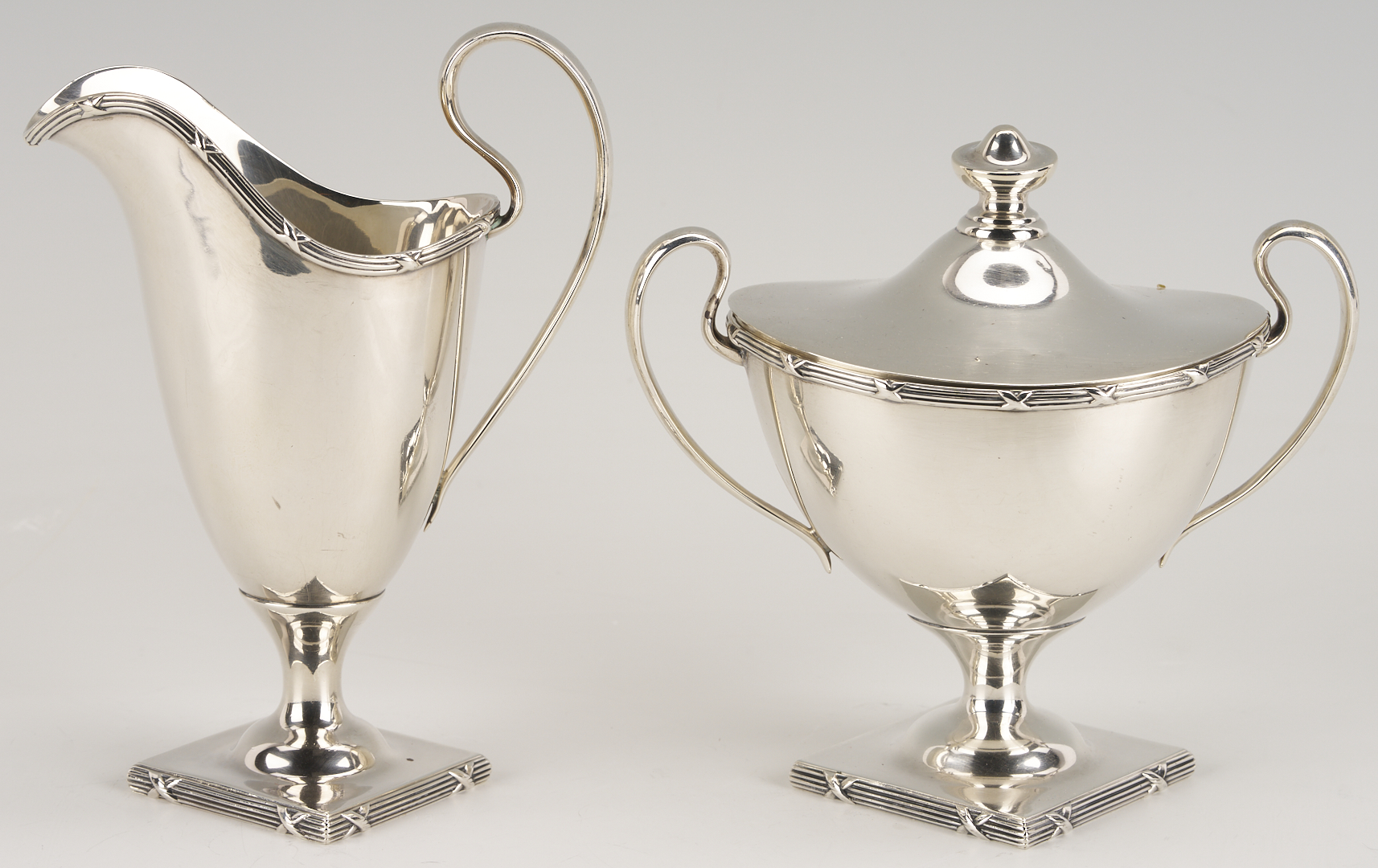 Lot 311: 4 pc Mauser Sterling Silver Tea Set plus Silverplated Tray