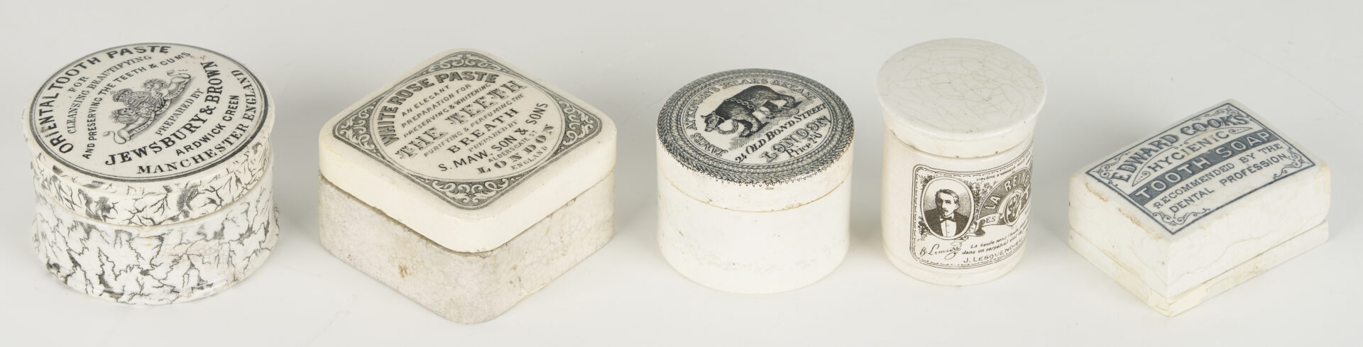 Lot 393: 10 Small White Porcelain Pharmacy Jars: Toothpaste, Advertising, etc.