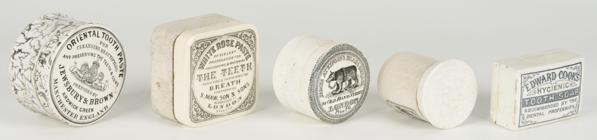 Lot 393: 10 Small White Porcelain Pharmacy Jars: Toothpaste, Advertising, etc.