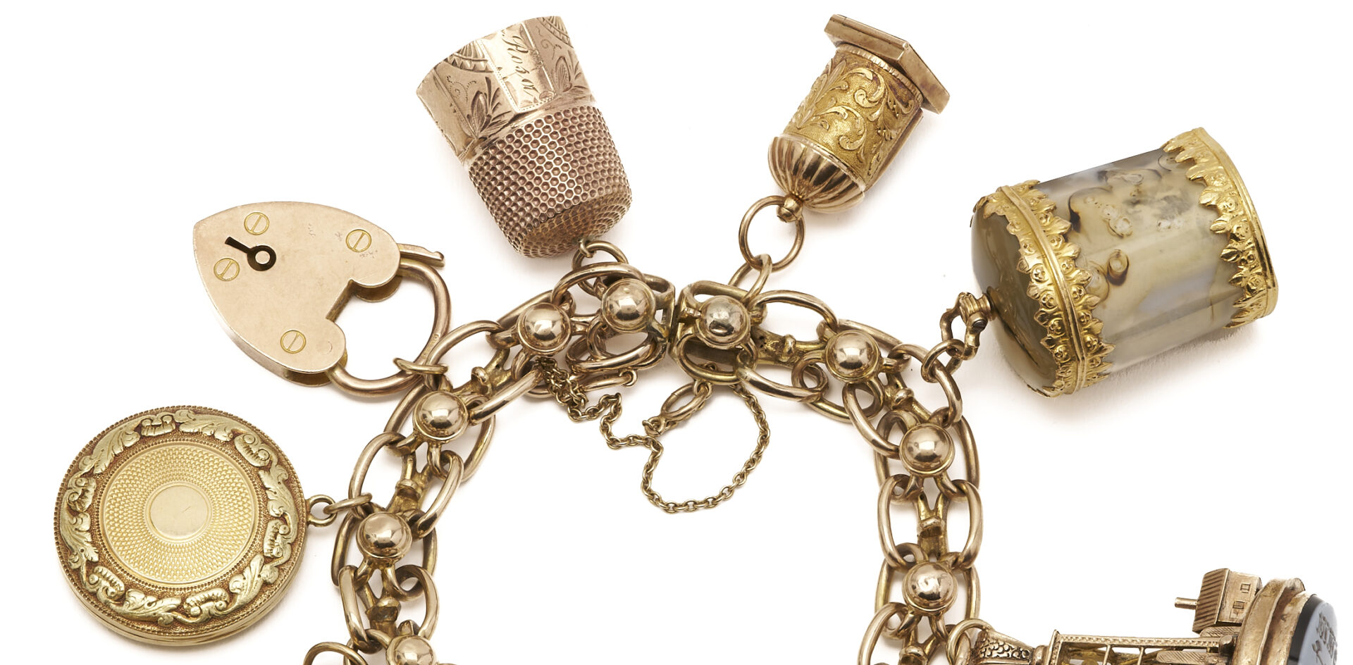 Lot 39: Victorian 10K Yellow Gold Charm Bracelet w/ 10 Charms