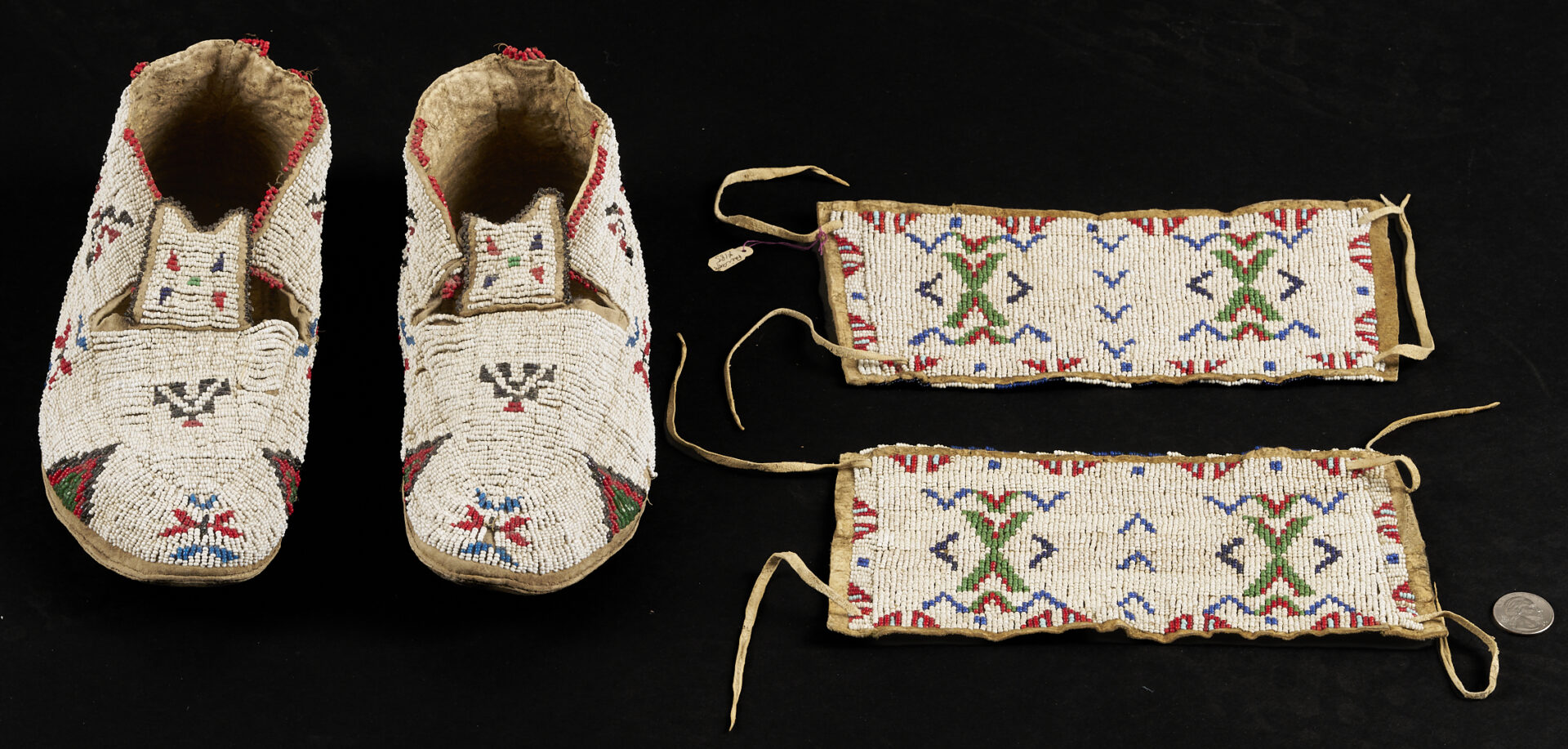 Lot 491: Native American Sioux Beaded Hide Cuffs & Moccasins