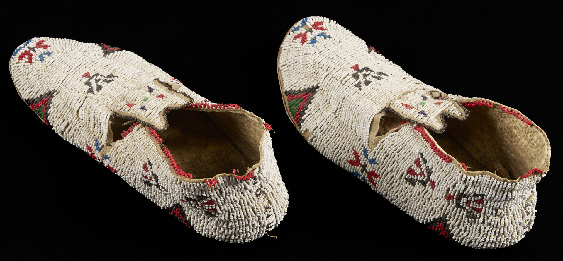Lot 491: Native American Sioux Beaded Hide Cuffs & Moccasins