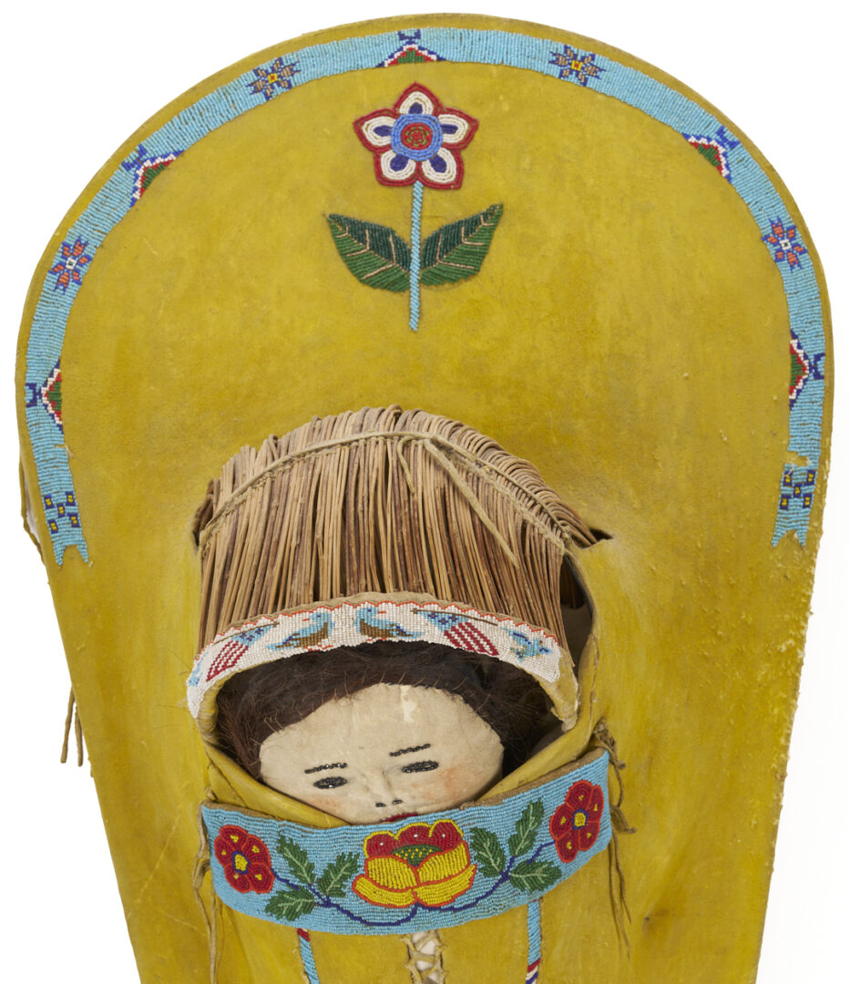 Lot 492: Large Ute Beaded Hide Doll Cradle Board