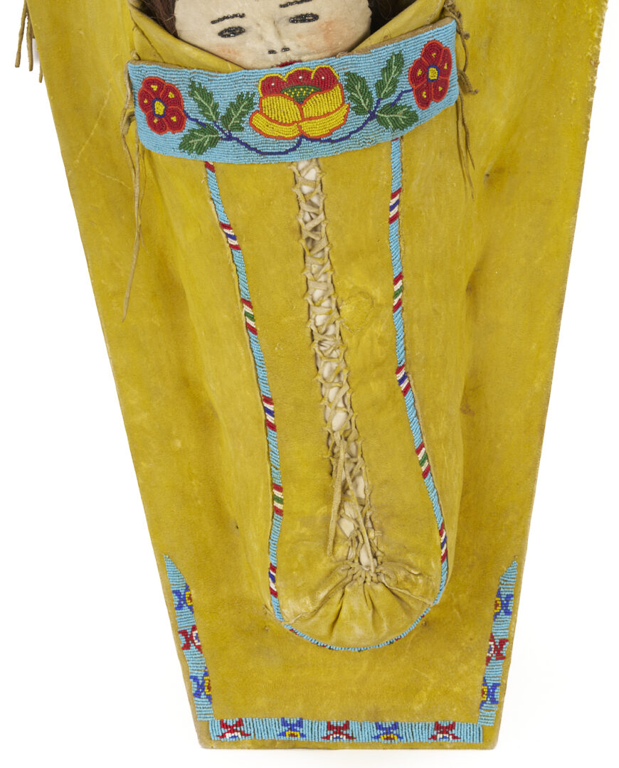 Lot 492: Large Ute Beaded Hide Doll Cradle Board
