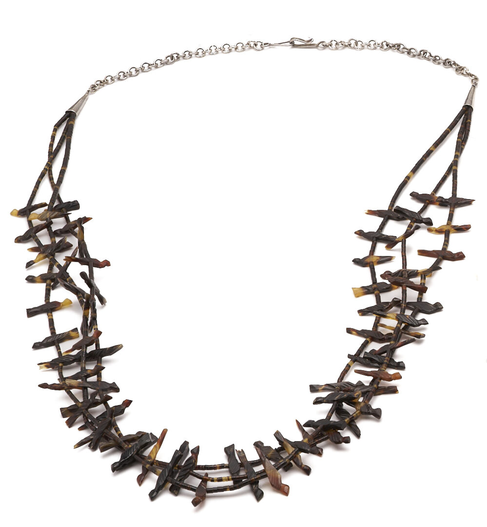 Lot 502: 3 Native American Carved Necklaces, incl. Fetish
