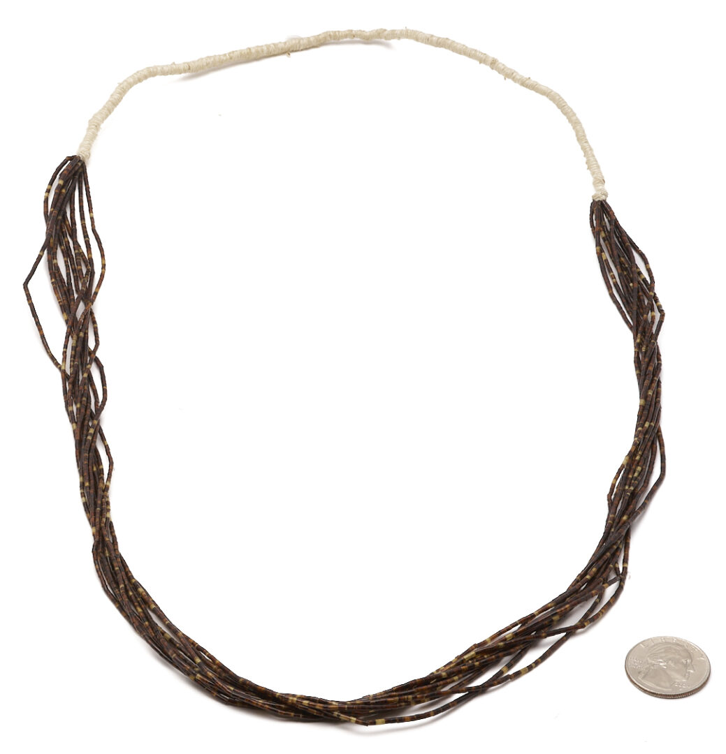 Lot 502: 3 Native American Carved Necklaces, incl. Fetish