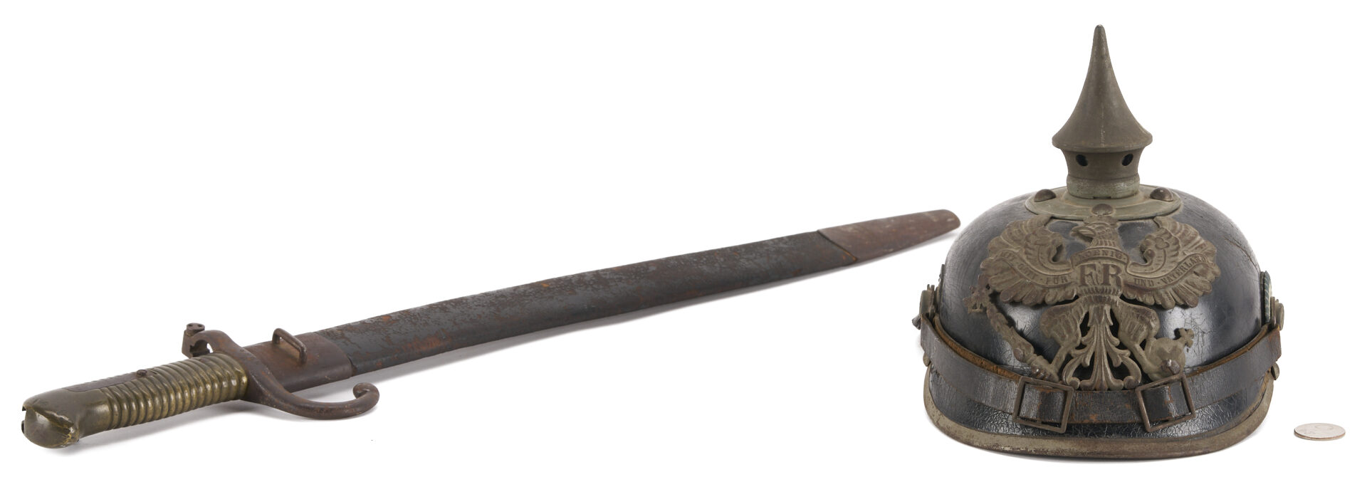 Lot 530: German/Prussian Bayonet & Military Helmet