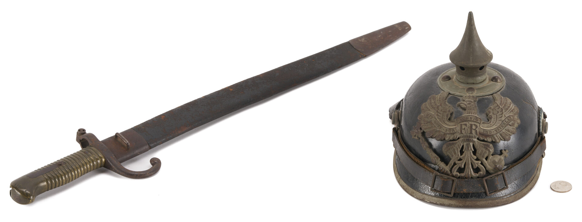Lot 530: German/Prussian Bayonet & Military Helmet