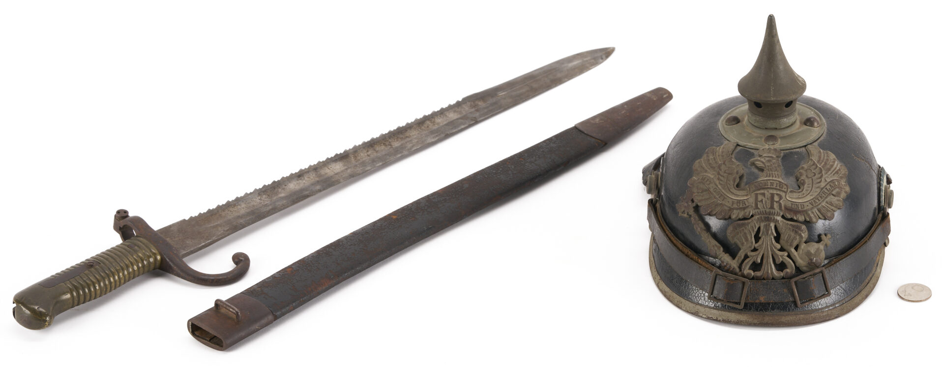 Lot 530: German/Prussian Bayonet & Military Helmet