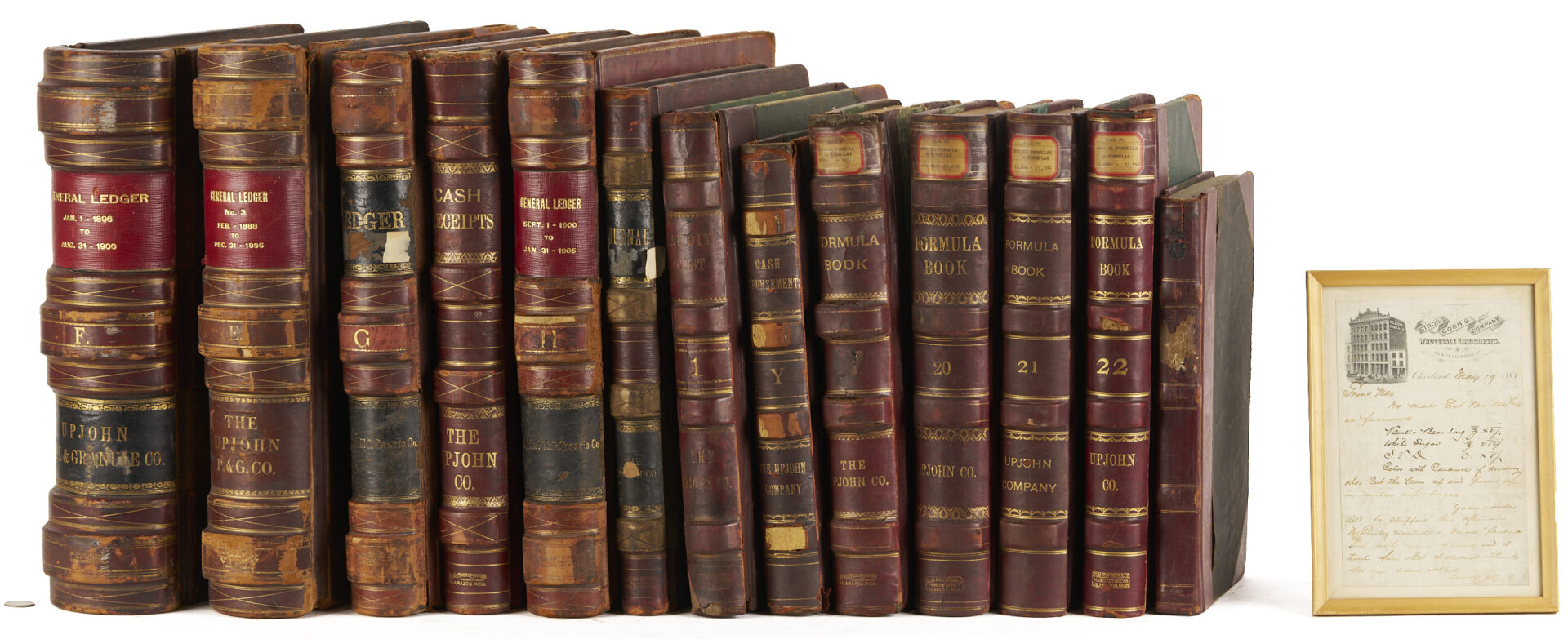 Lot 572: Leatherbound Records of Upjohn Company & Framed Formula