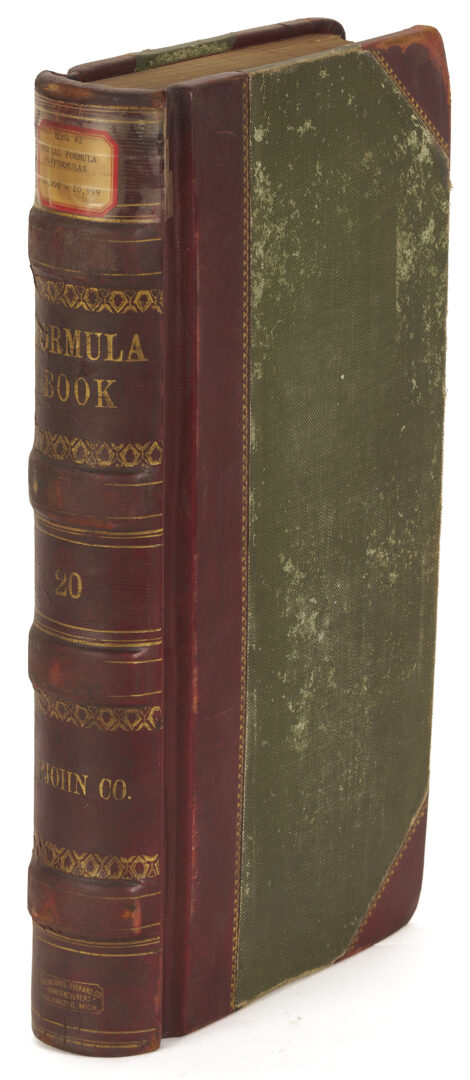 Lot 572: Leatherbound Records of Upjohn Company & Framed Formula