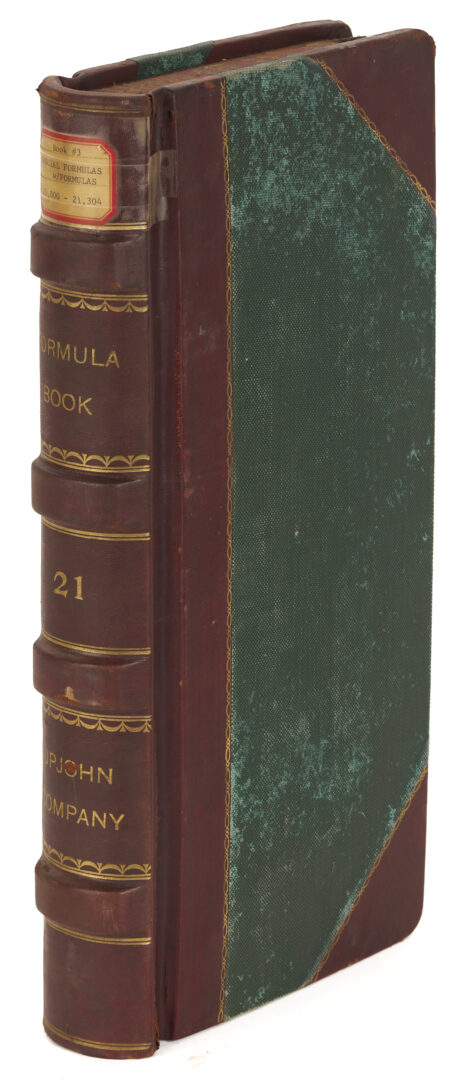 Lot 572: Leatherbound Records of Upjohn Company & Framed Formula