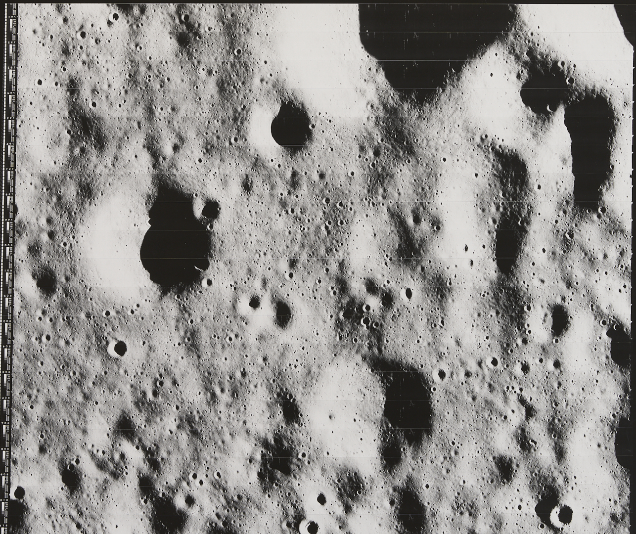 Lot 576: Four NASA Lunar Survey Photos, II-64H2, II-92M, II-138M, II-149H1