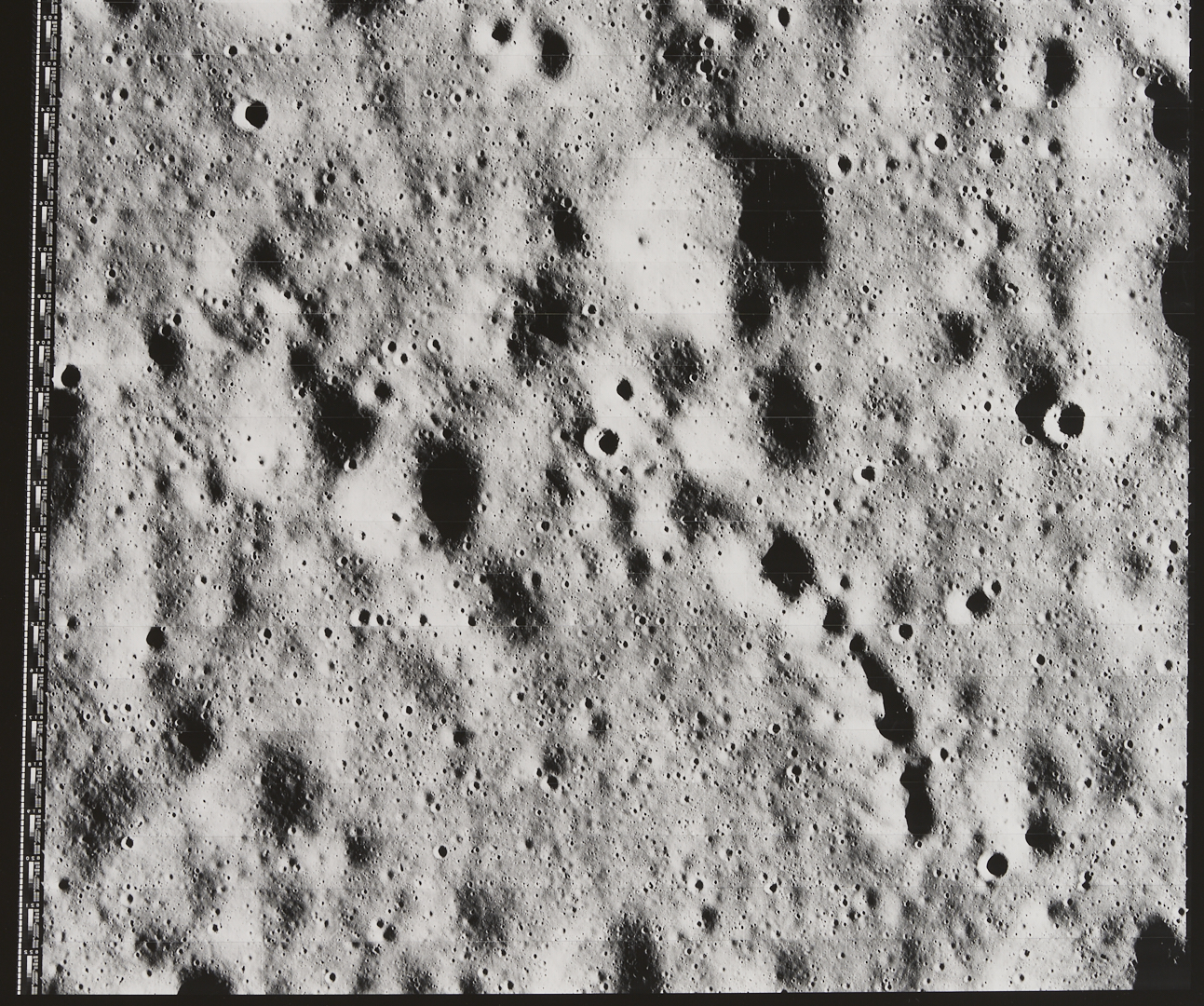Lot 576: Four NASA Lunar Survey Photos, II-64H2, II-92M, II-138M, II-149H1