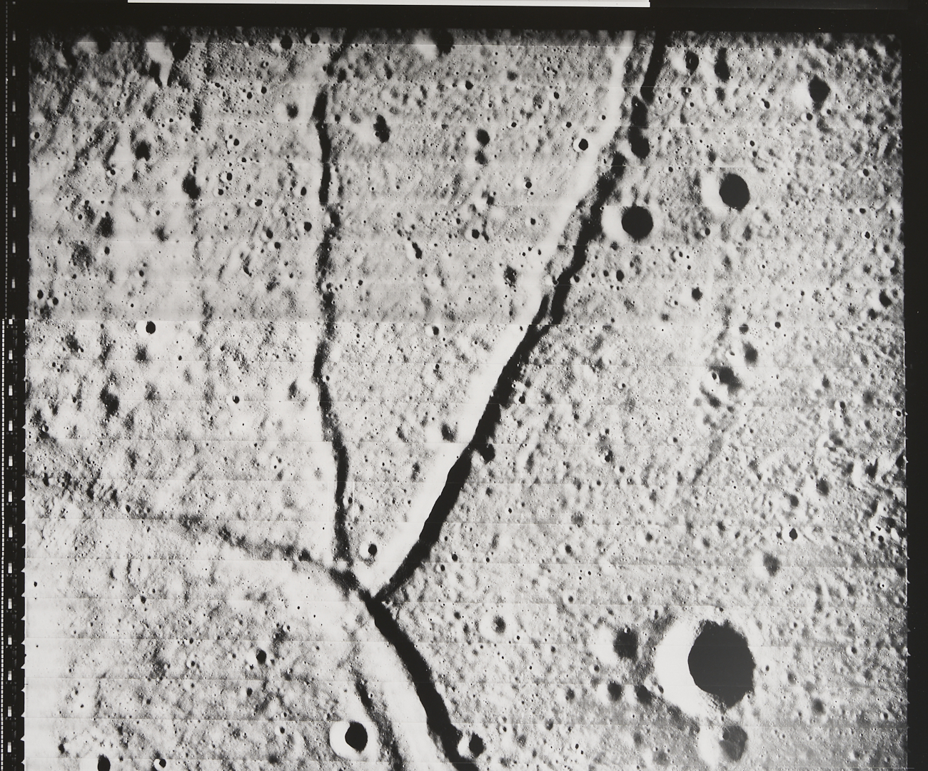 Lot 576: Four NASA Lunar Survey Photos, II-64H2, II-92M, II-138M, II-149H1