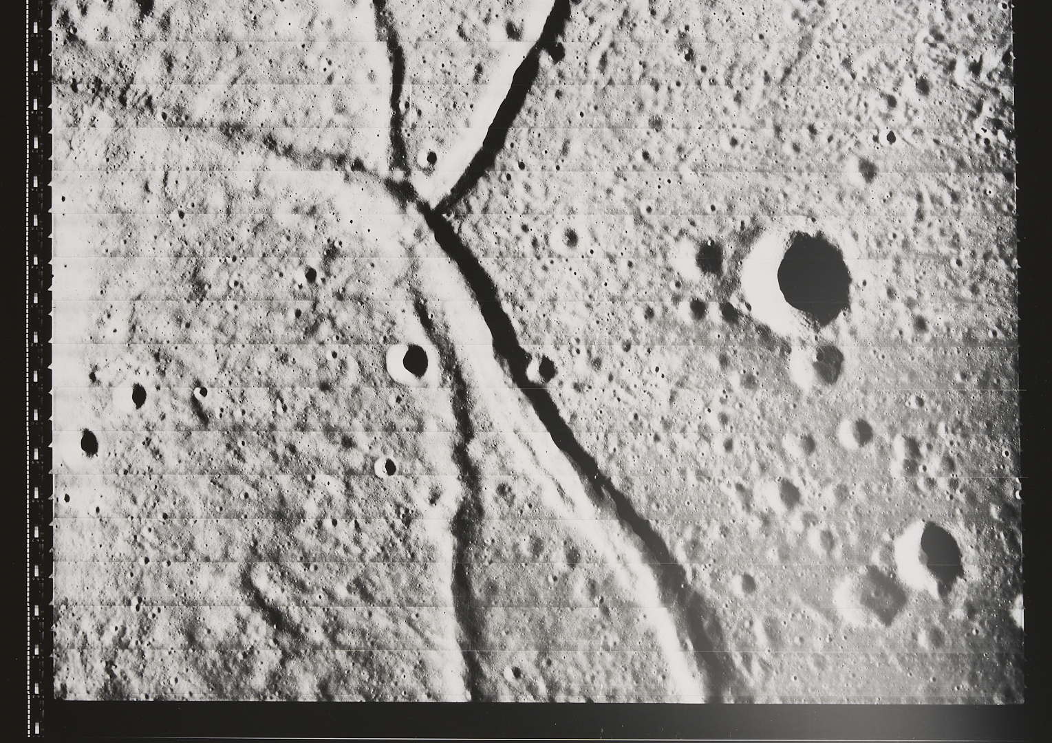 Lot 576: Four NASA Lunar Survey Photos, II-64H2, II-92M, II-138M, II-149H1
