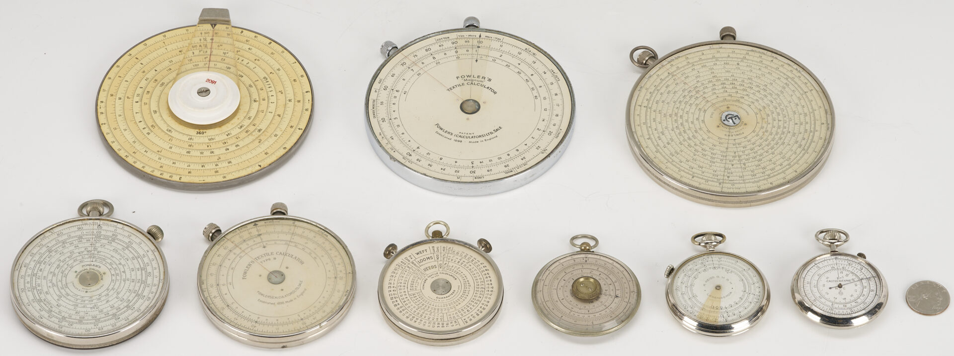 Lot 578: Collection of 9 Circular Slide Rules / Calculators Incl. Fowler