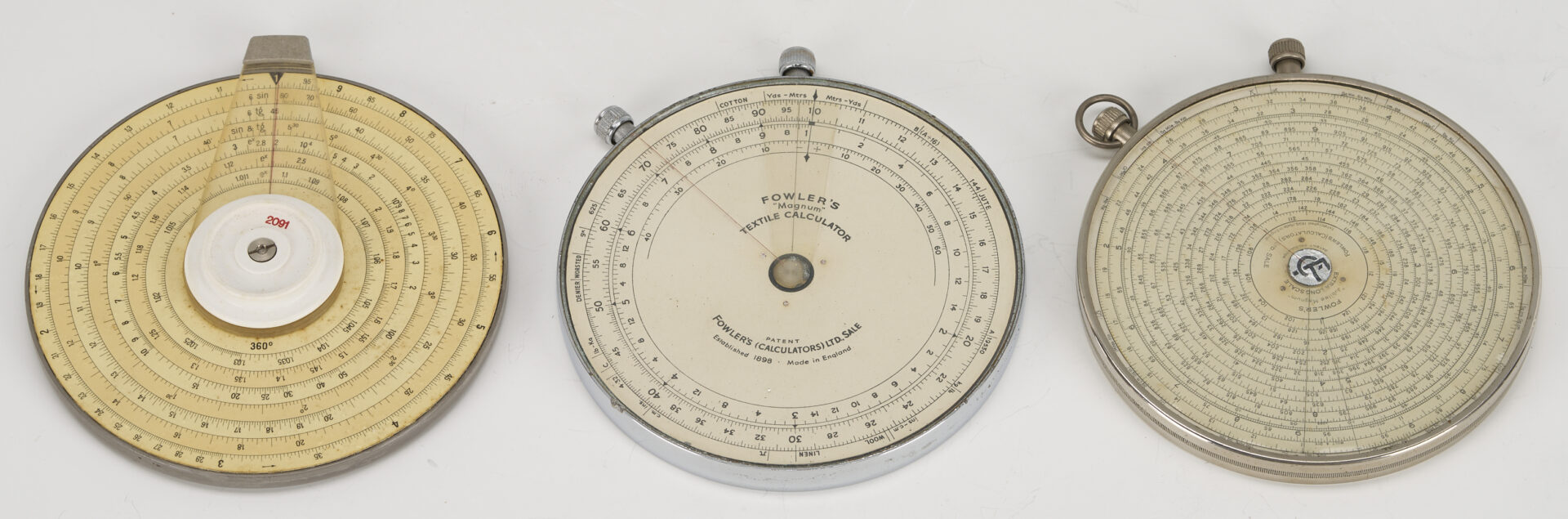 Lot 578: Collection of 9 Circular Slide Rules / Calculators Incl. Fowler
