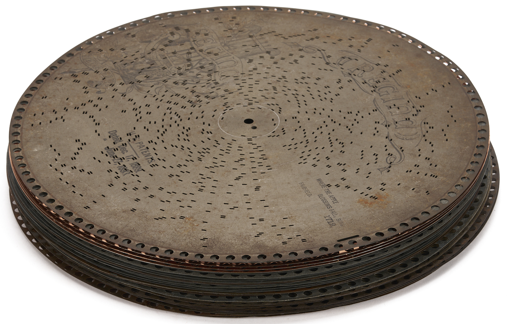 Lot 590: Regina Music Box Style 10, Pagoda Top, plus 26 discs and book