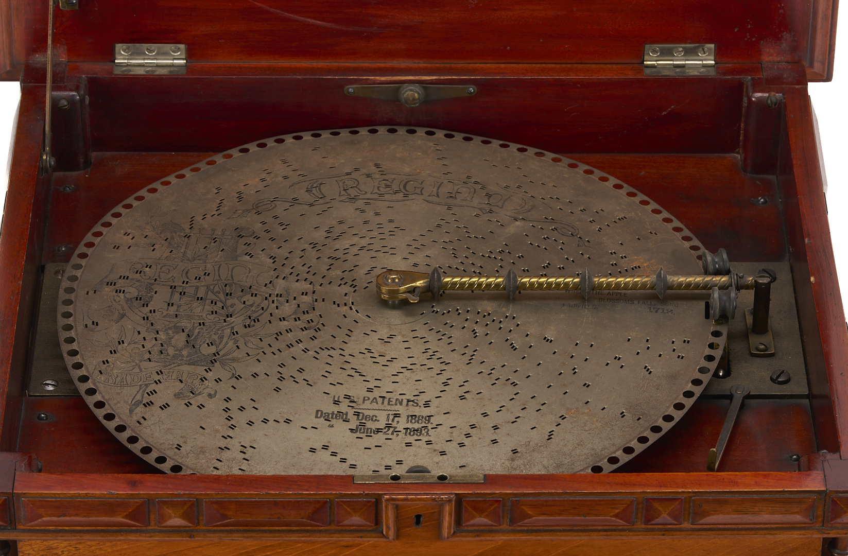 Lot 590: Regina Music Box Style 10, Pagoda Top, plus 26 discs and book