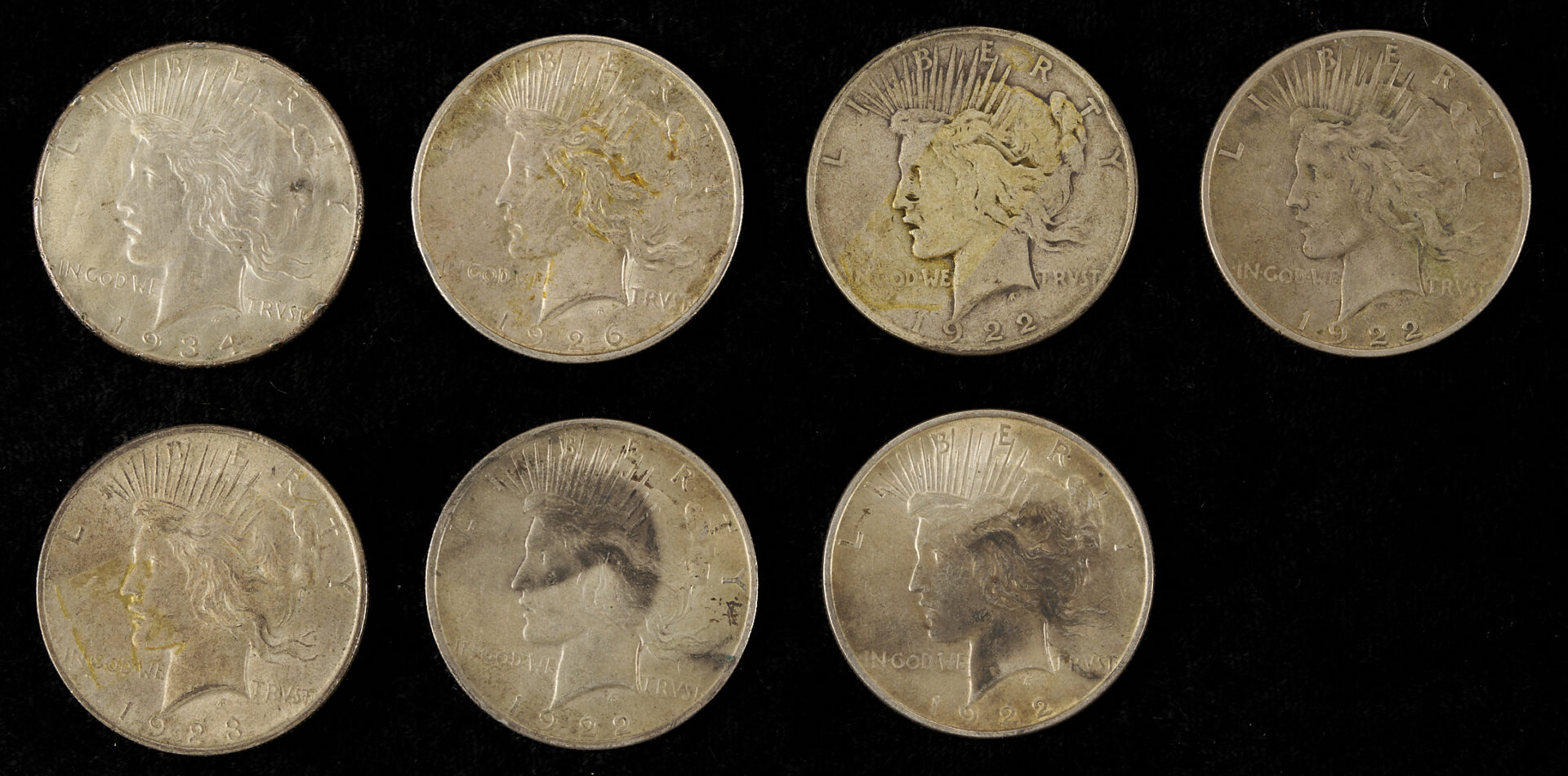 Lot 612: 19 US Silver Coins – 10 Morgan Dollars, 7 Peace Dollars, and 2 Half-Dollars