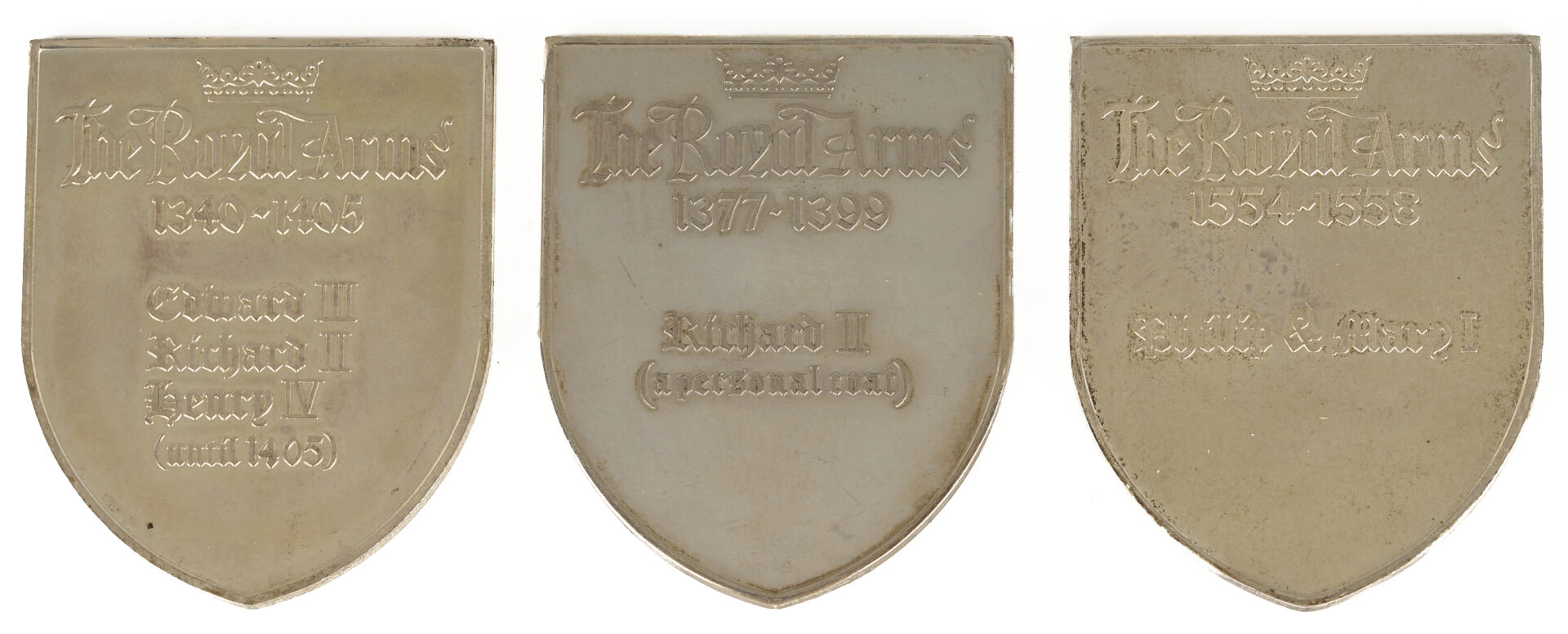 Lot 615: 9 English Silver Ingots, incl. Shield Form