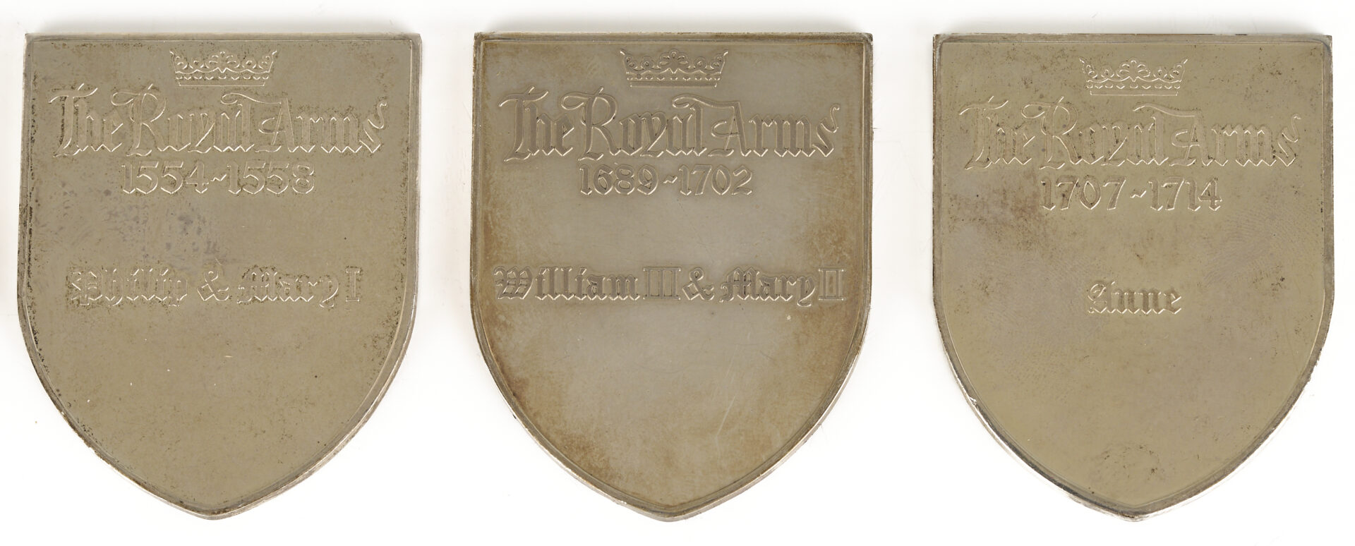 Lot 615: 9 English Silver Ingots, incl. Shield Form
