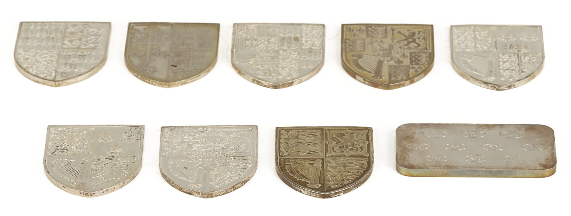 Lot 615: 9 English Silver Ingots, incl. Shield Form