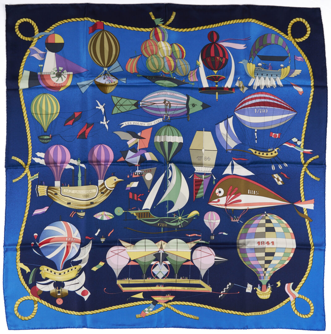 Lot 640: 2 Hermes Silk Twill Scarves: Les Folies Du Ciel, Dark Blue & Red