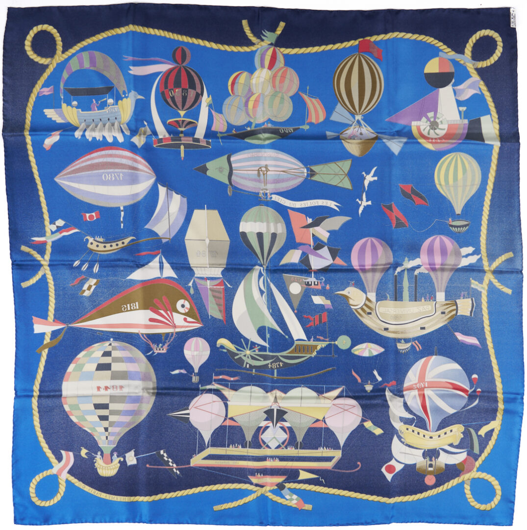 Lot 640: 2 Hermes Silk Twill Scarves: Les Folies Du Ciel, Dark Blue & Red