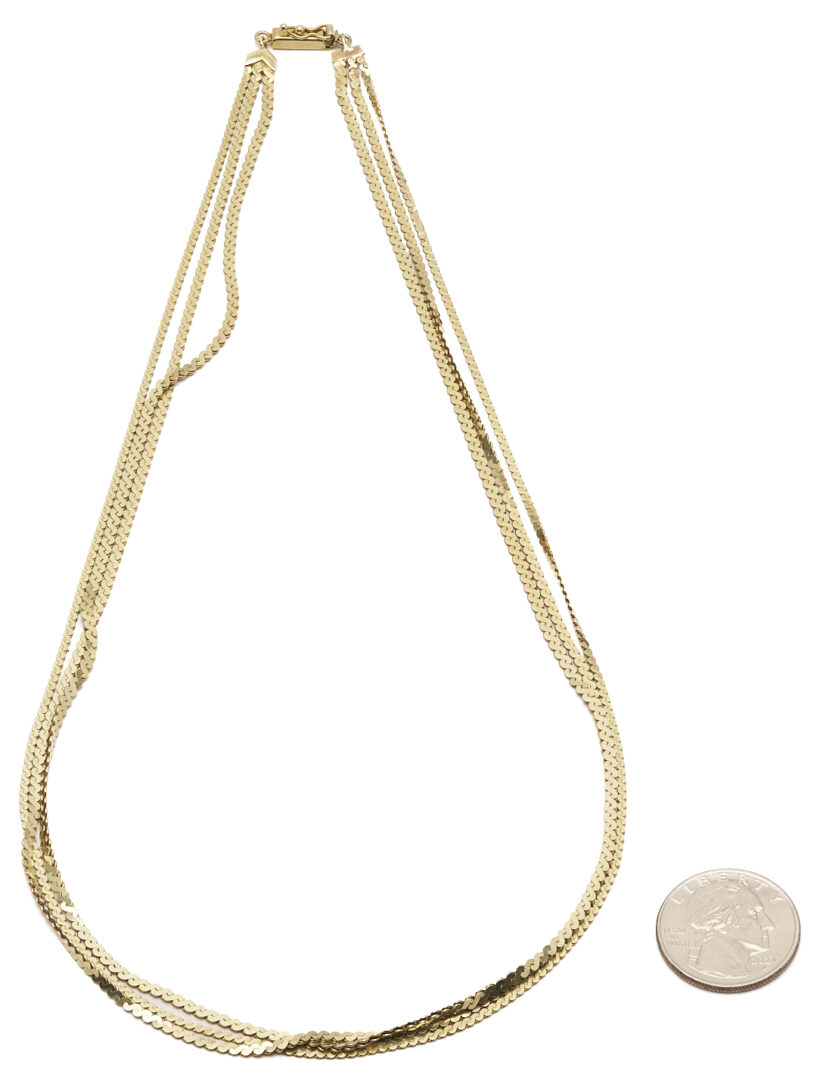 Lot 653: Italian 14K Gold Three Strand Flat Serpentine Necklace UnoAerre