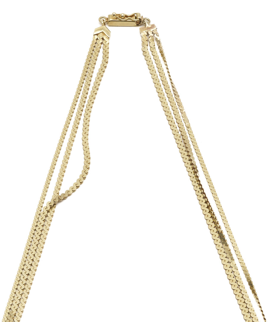 Lot 653: Italian 14K Gold Three Strand Flat Serpentine Necklace UnoAerre