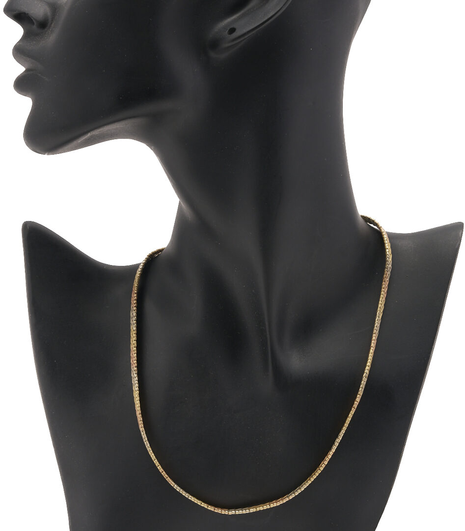 Lot 655: 14K Tri-Color Gold Italian Serpentine Necklace