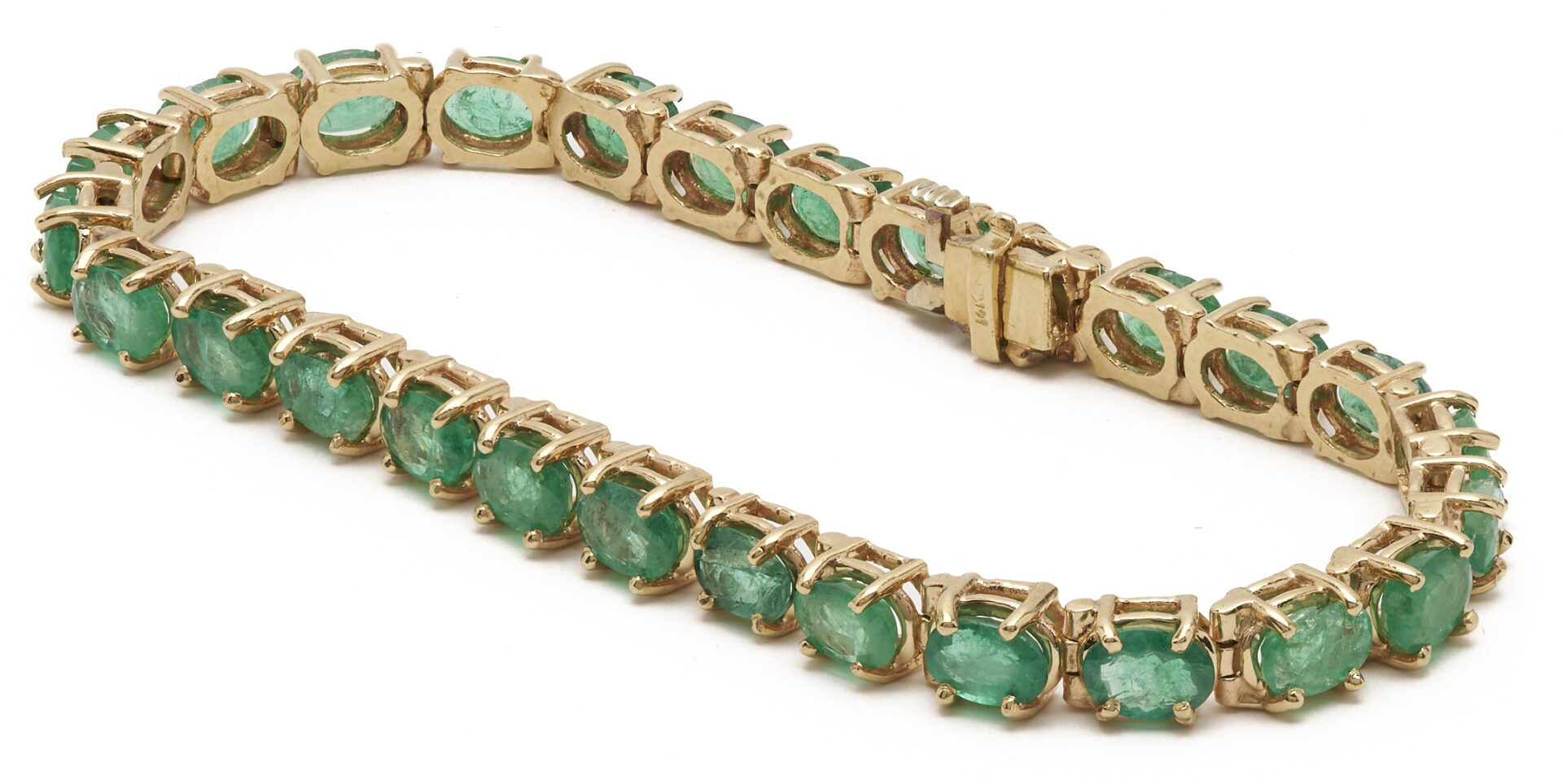 Lot 659: Ladies 14K Emerald Tennis Bracelet
