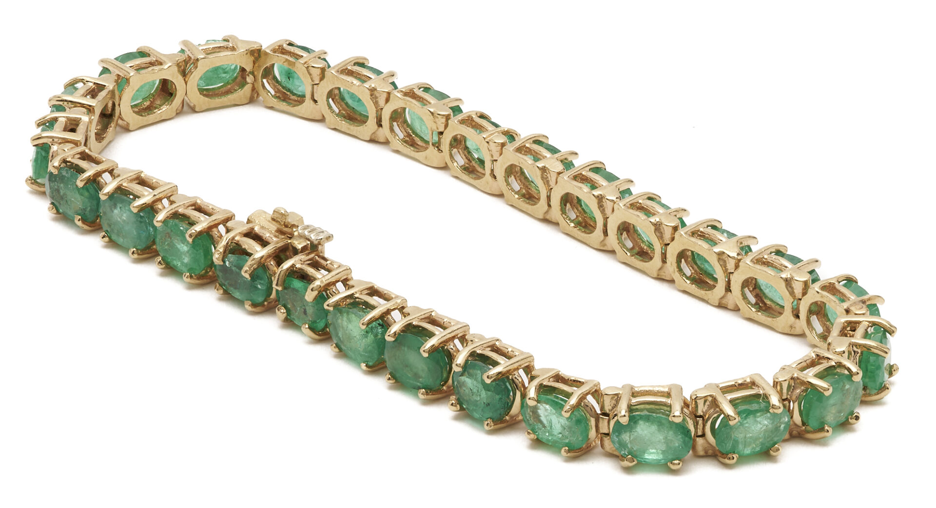 Lot 659: Ladies 14K Emerald Tennis Bracelet