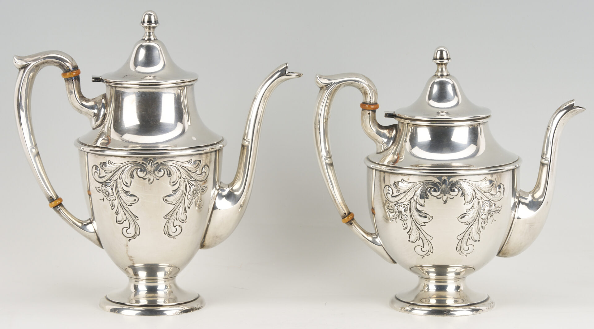 Lot 686: Dunkirk Hand Chased 5 pc. Sterling Silver Tea Set