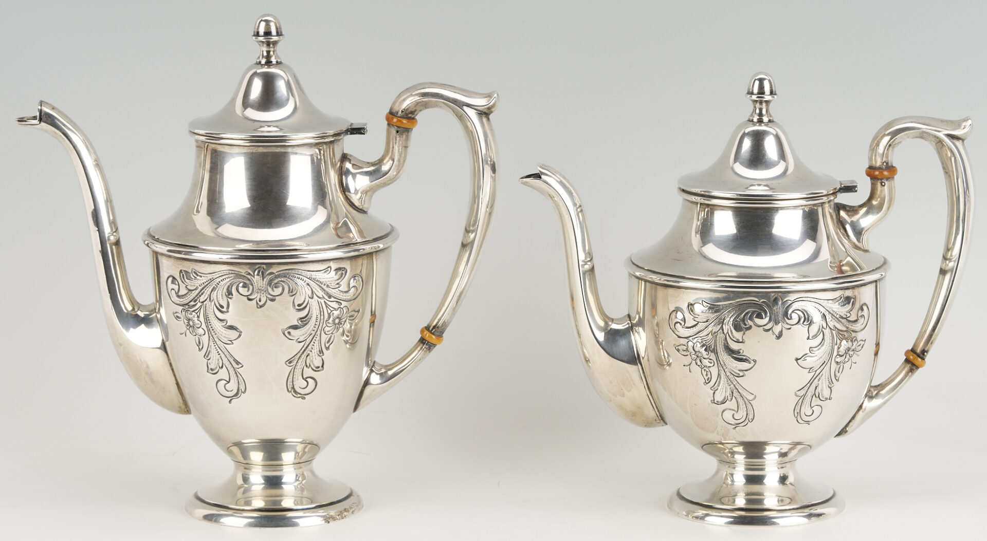 Lot 686: Dunkirk Hand Chased 5 pc. Sterling Silver Tea Set