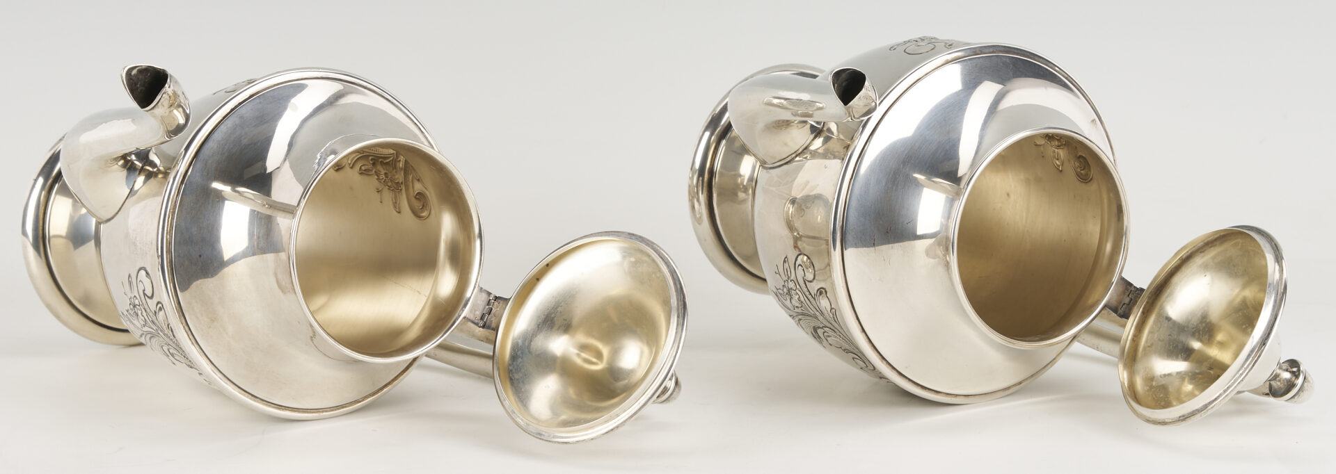 Lot 686: Dunkirk Hand Chased 5 pc. Sterling Silver Tea Set
