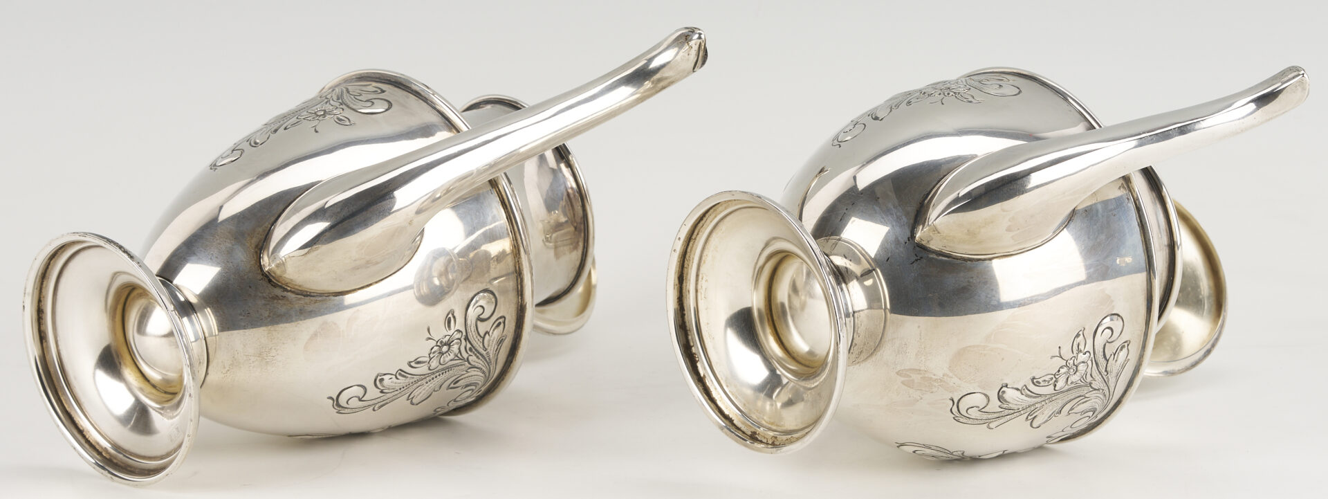 Lot 686: Dunkirk Hand Chased 5 pc. Sterling Silver Tea Set