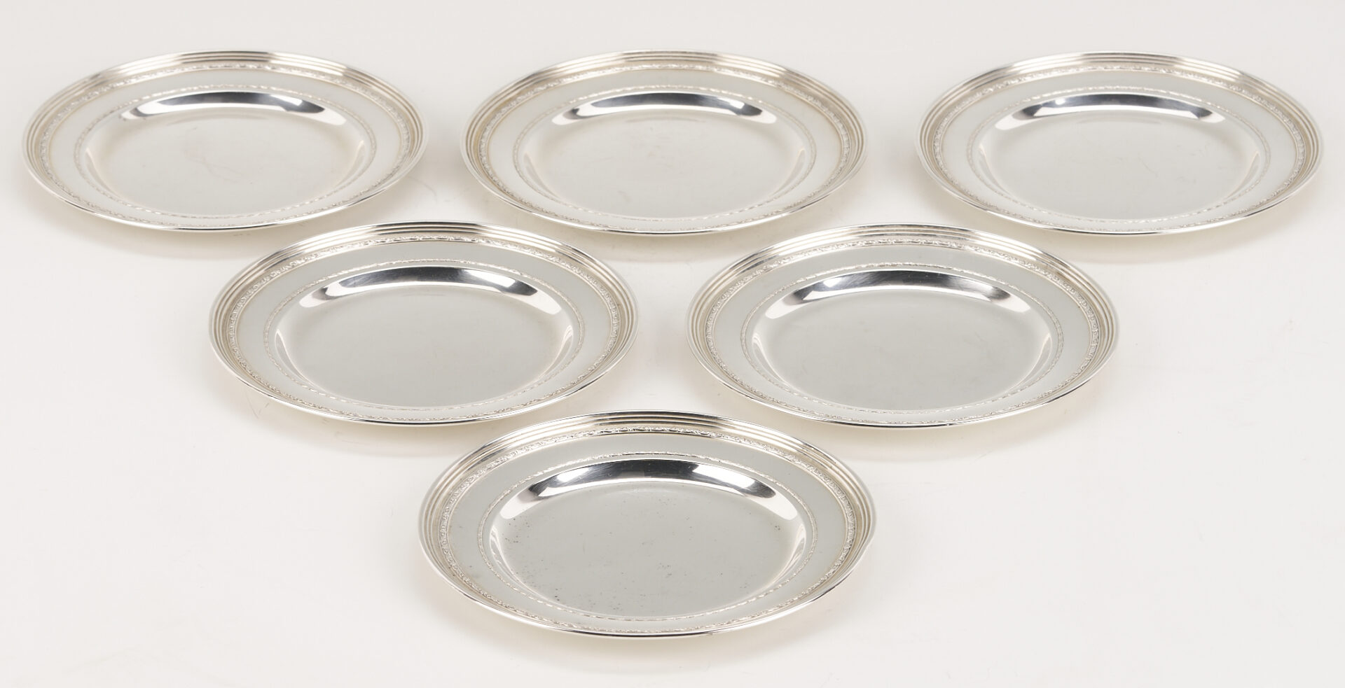 Lot 706: Kirk Sterling Pitcher plus 6 International Sterling Bread Plates