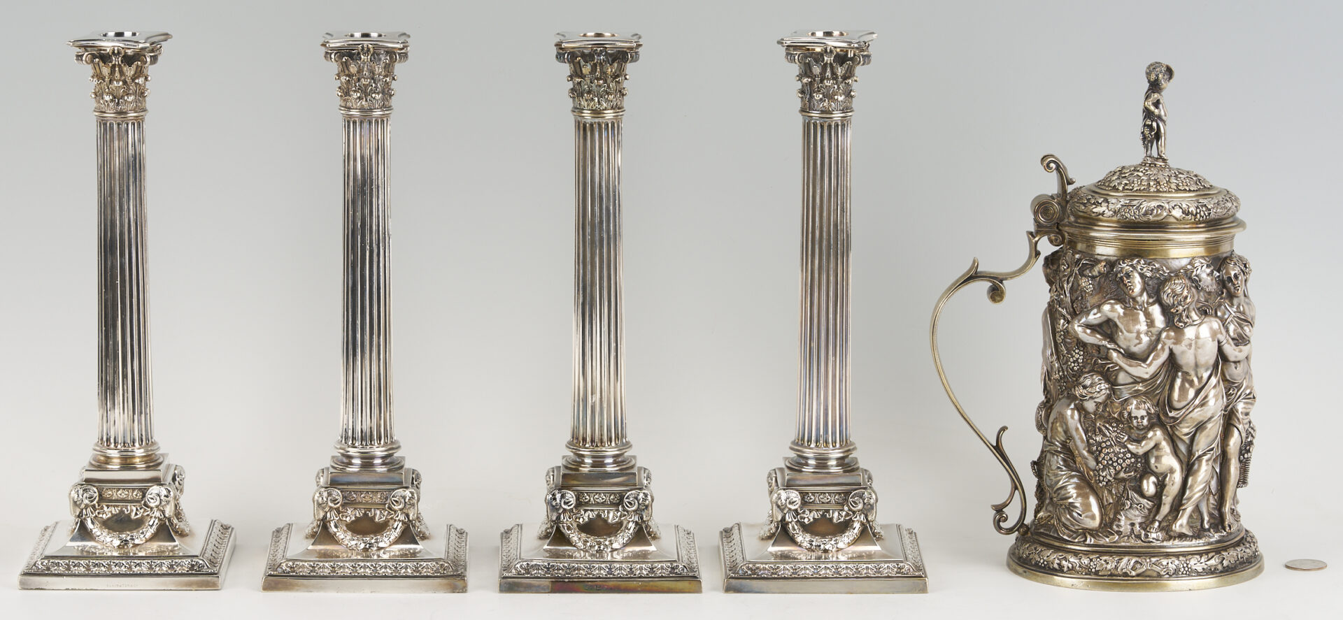 Lot 711: Elkington Electrotype Tankard plus 4 Candlesticks