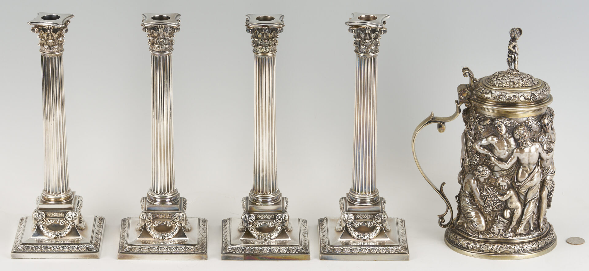 Lot 711: Elkington Electrotype Tankard plus 4 Candlesticks