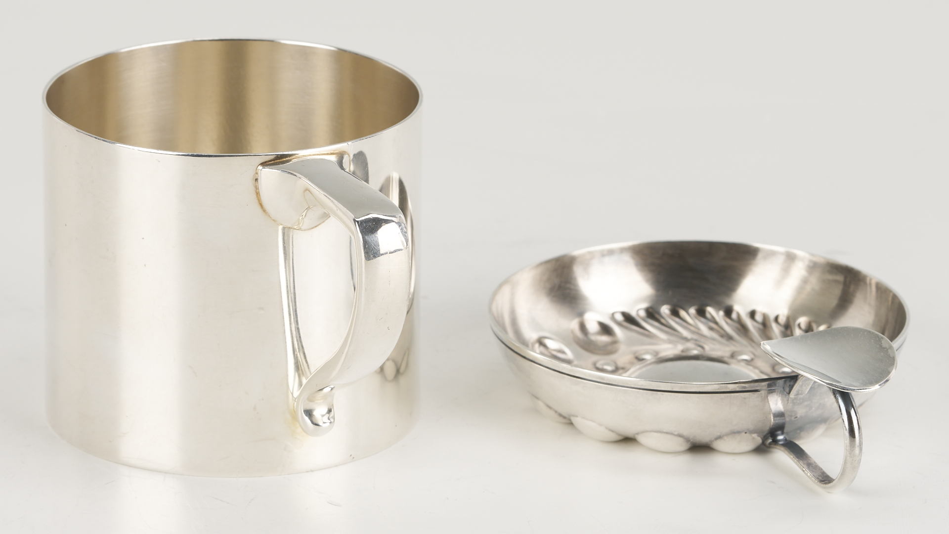 Lot 712: Sterling Caster & Mug Plus S/P Wine Cooler & Taster