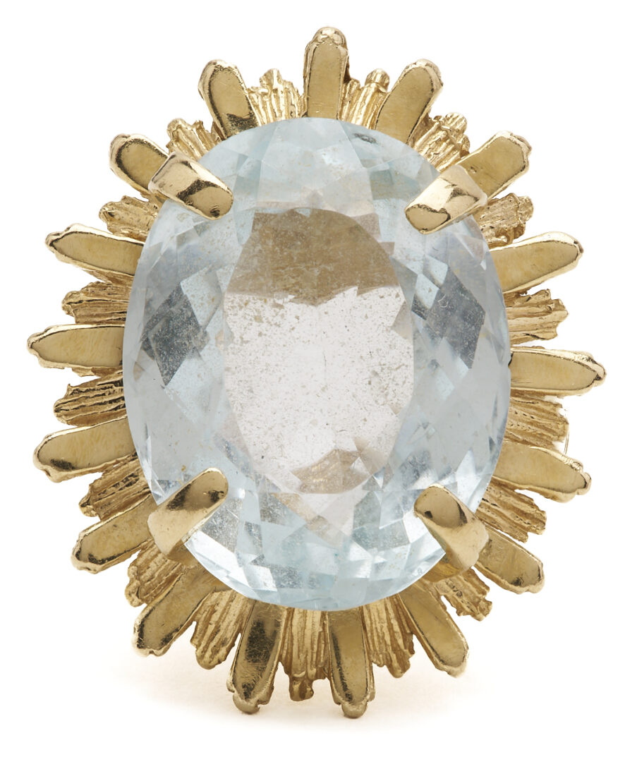 Lot 780: 14K Gold Cocktail Ring w/ Oval Cut Blue Topaz