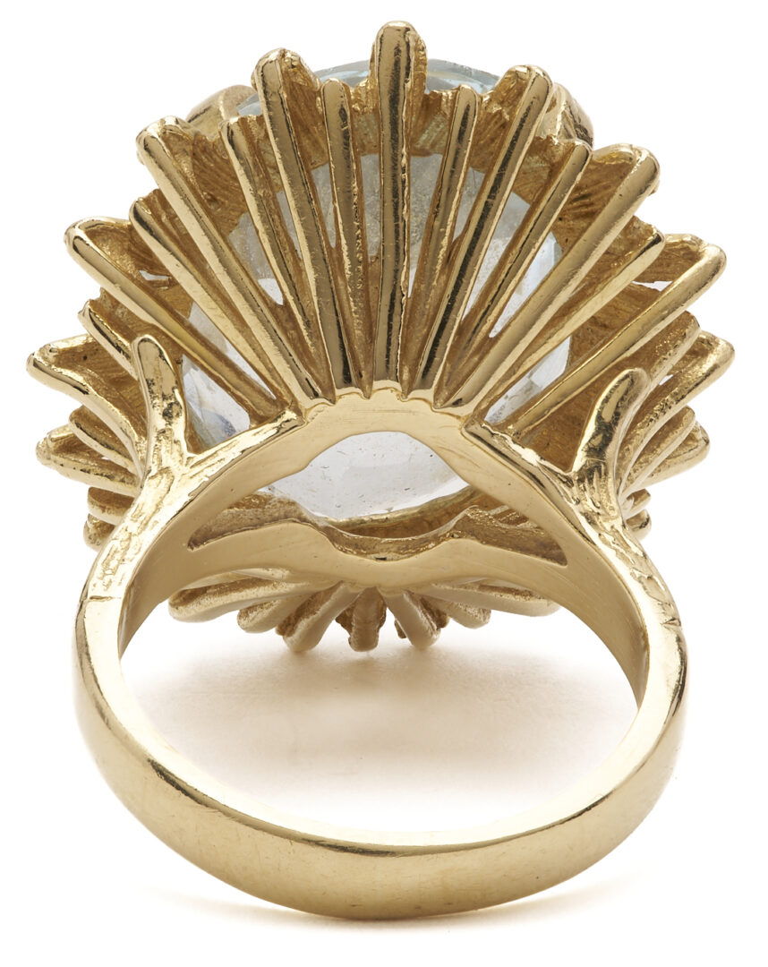 Lot 780: 14K Gold Cocktail Ring w/ Oval Cut Blue Topaz
