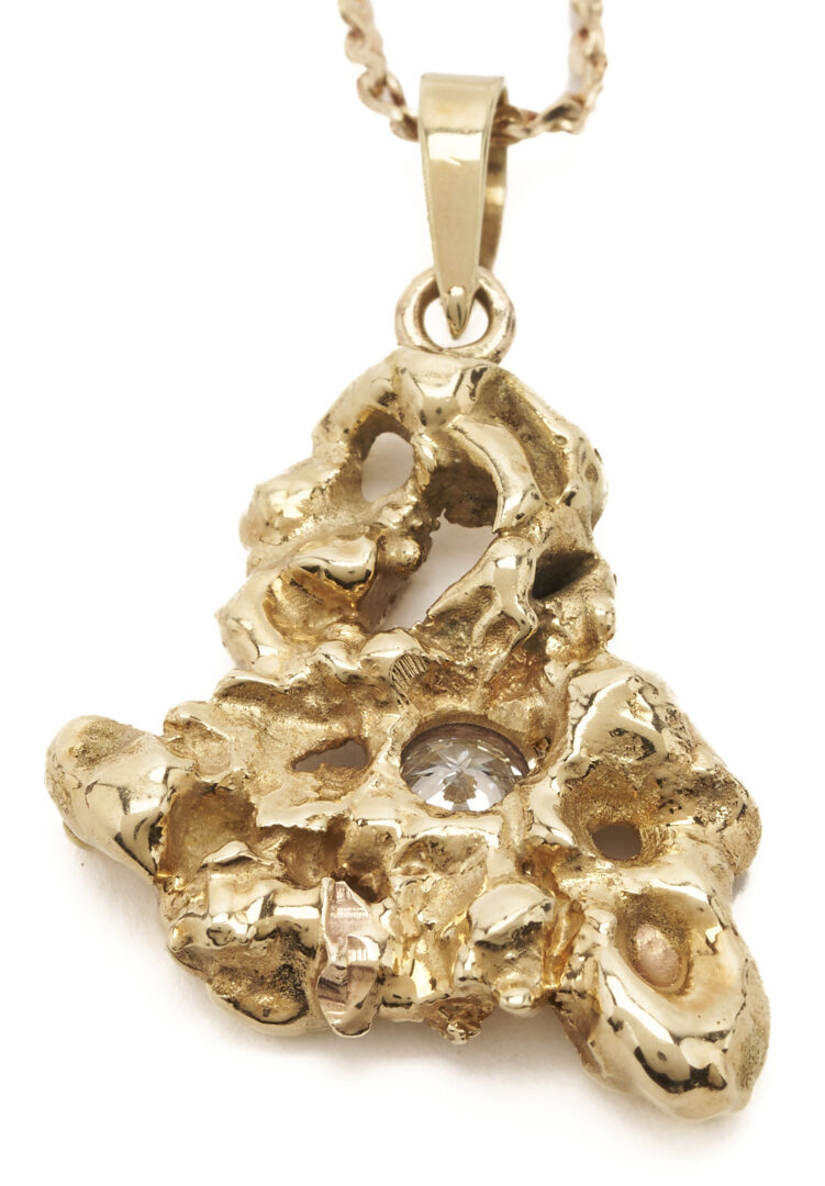 Lot 799: Yellow Gold & Diamond Nugget Pendant Necklace