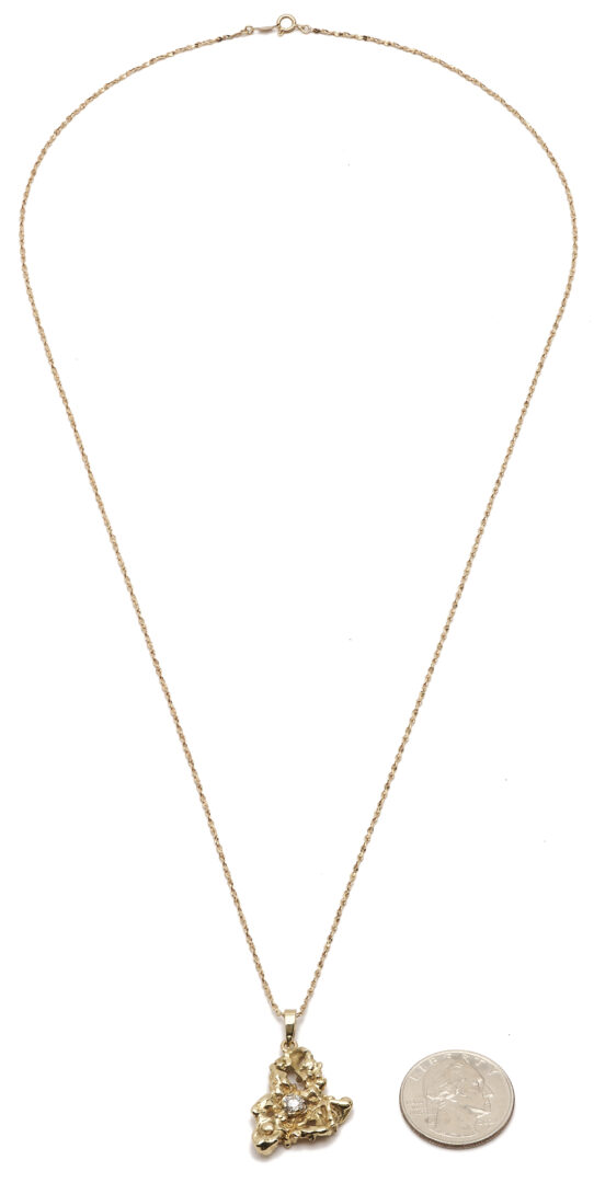 Lot 799: Yellow Gold & Diamond Nugget Pendant Necklace